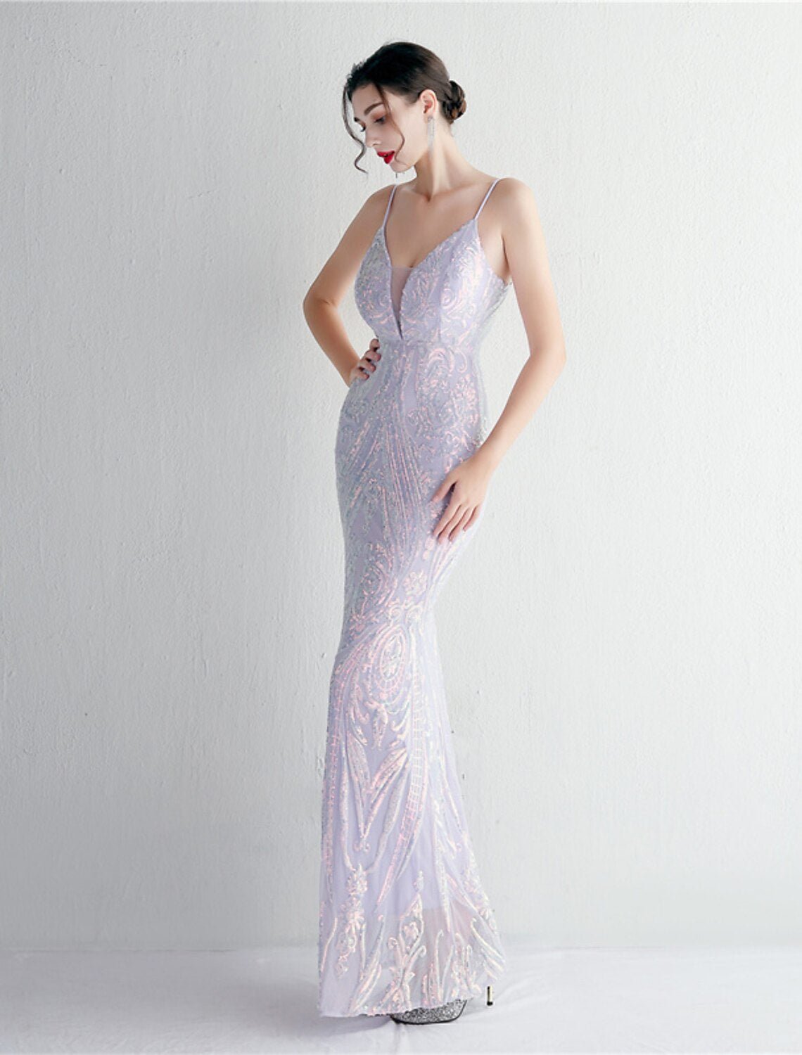 Full view of the mermaid trumpet silhouette evening dress.