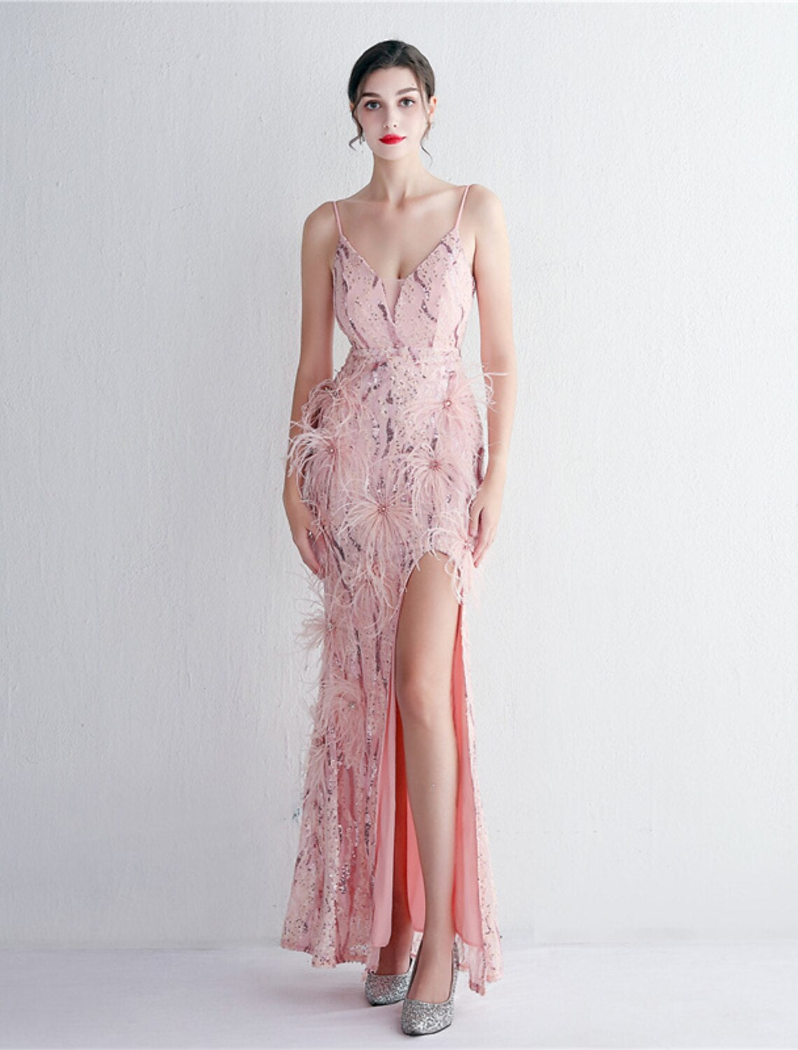 Close-up of sequin and beading detail on the mermaid evening dress.