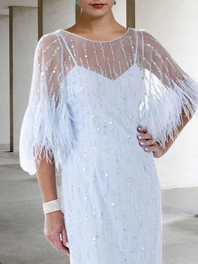 Side view of the sparkling Mother of the Bride dress, emphasizing the knee length and elegant drape.