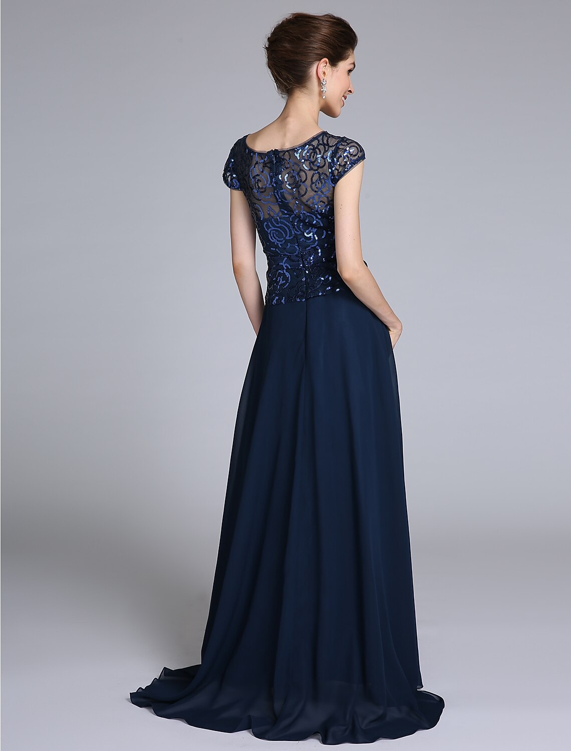 Side view of the sparkling sheath Mother of the Bride dress.