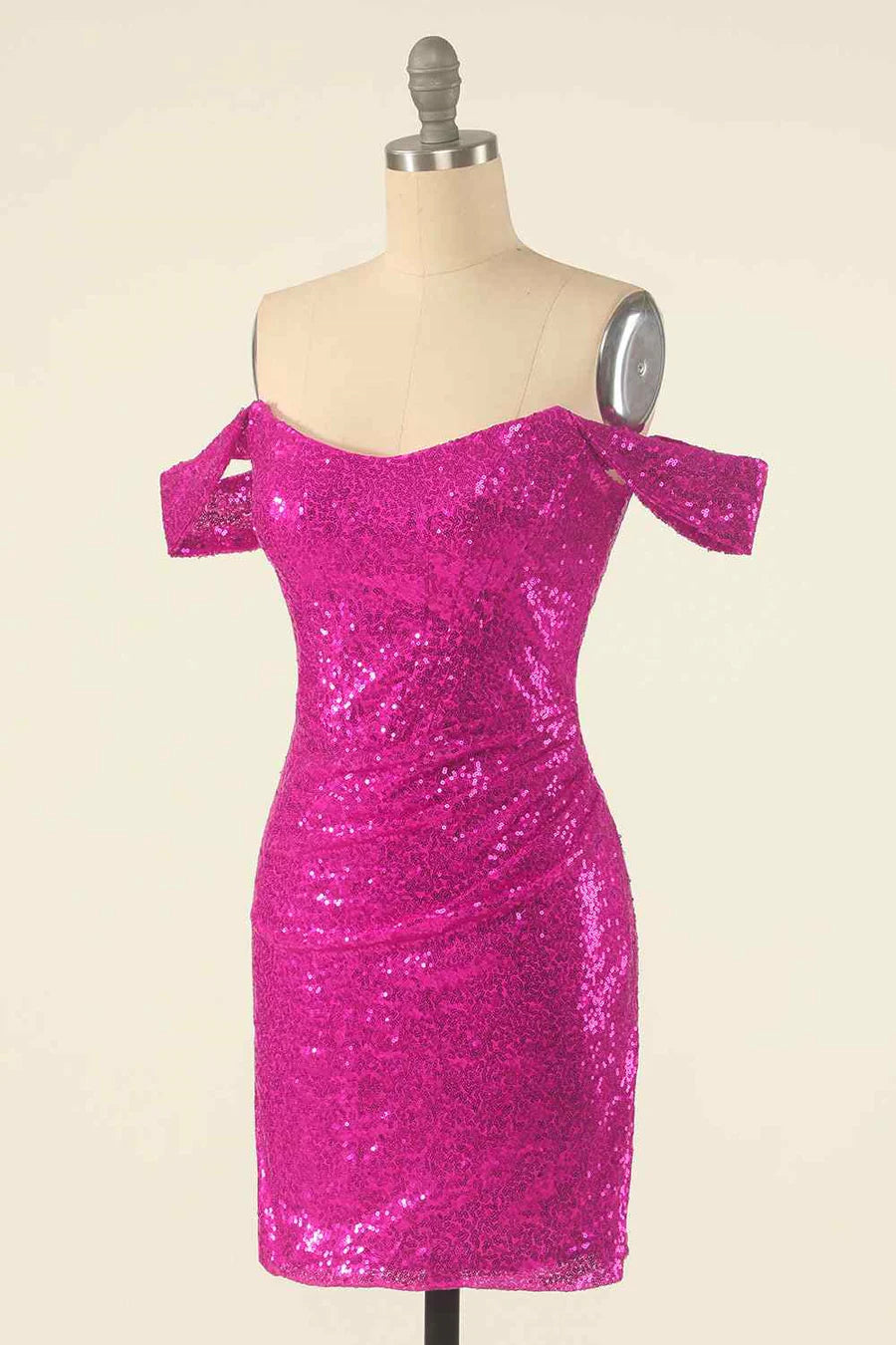 Back view of the pleated sequin maxi dress on a model.