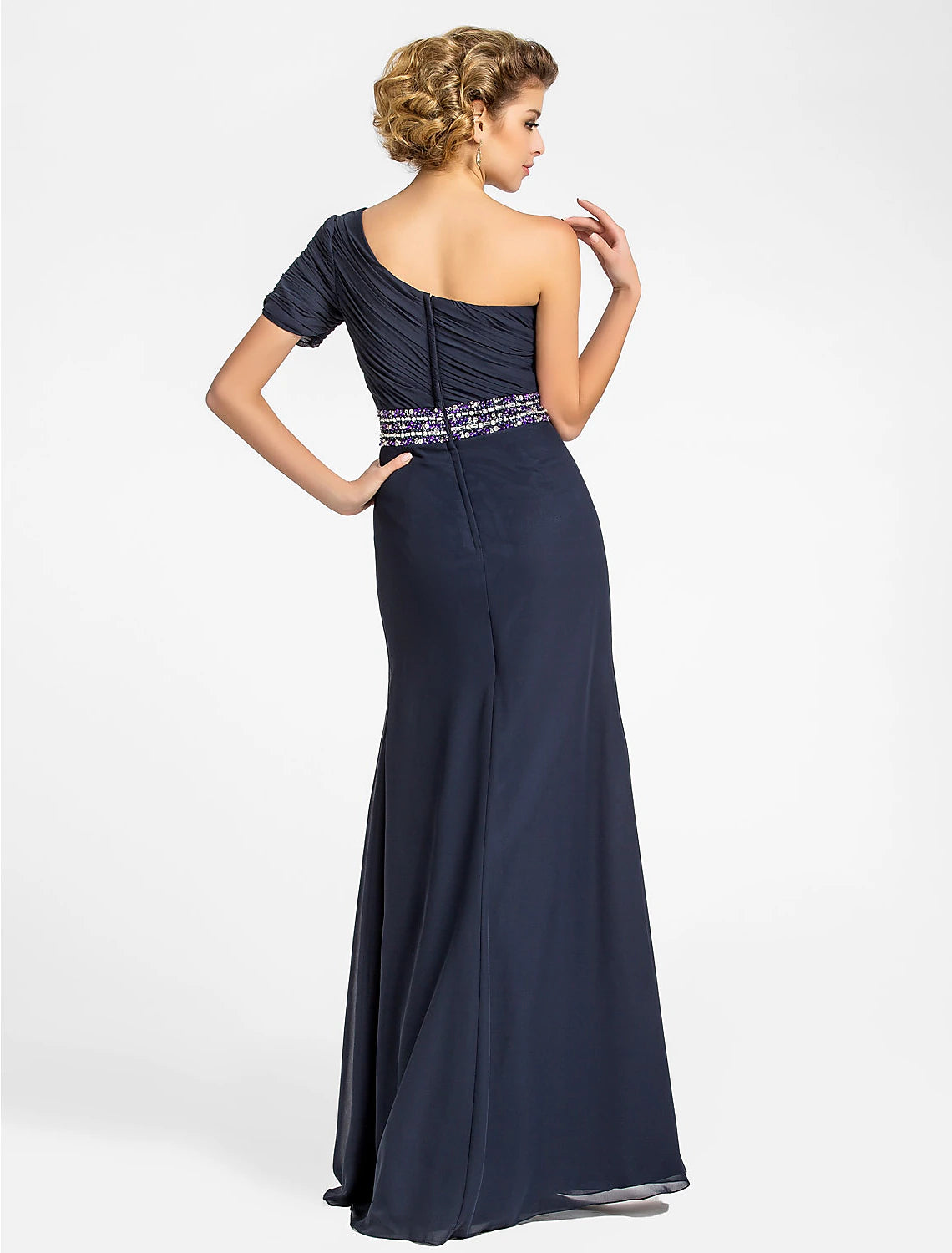 Side view of the elegant chiffon gown with draping and beading.