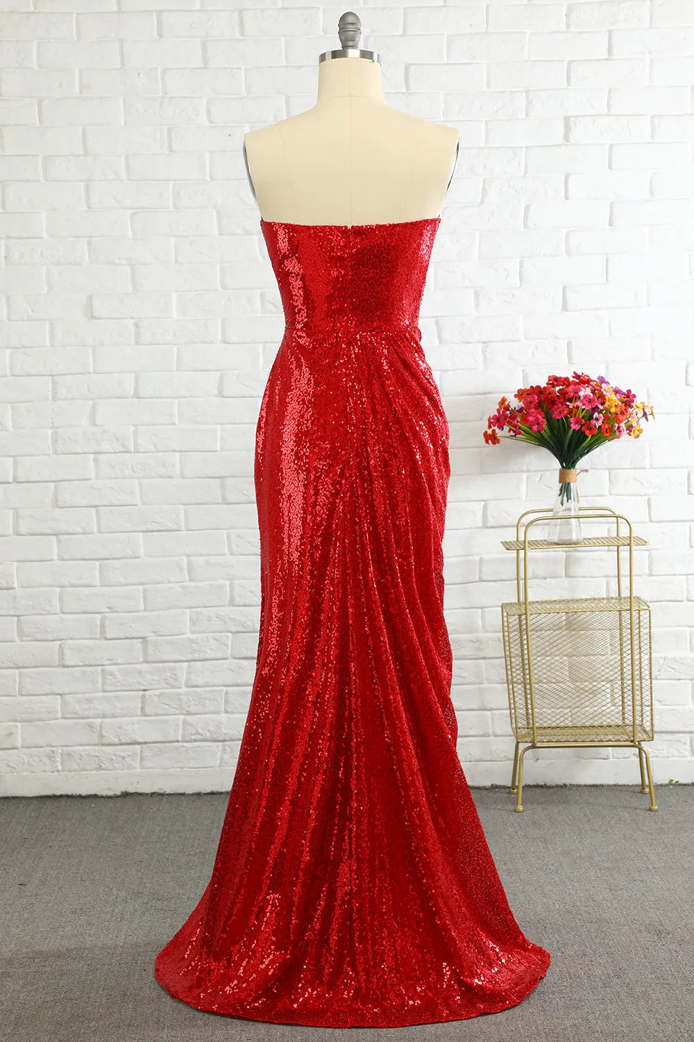 Back view of sequined sheath prom dress.