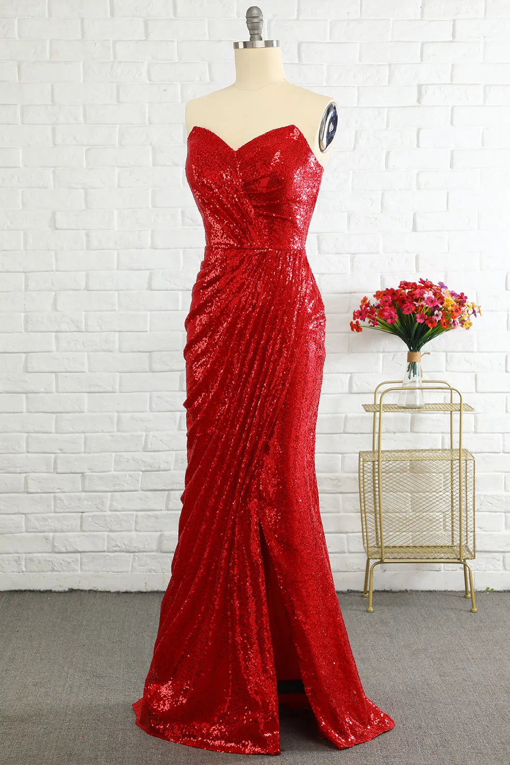 Side view of elegant sweetheart sequin gown.