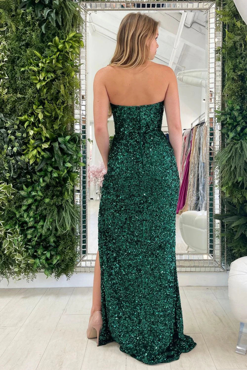 Elegant green sequin sheath evening dress with V-neckline.