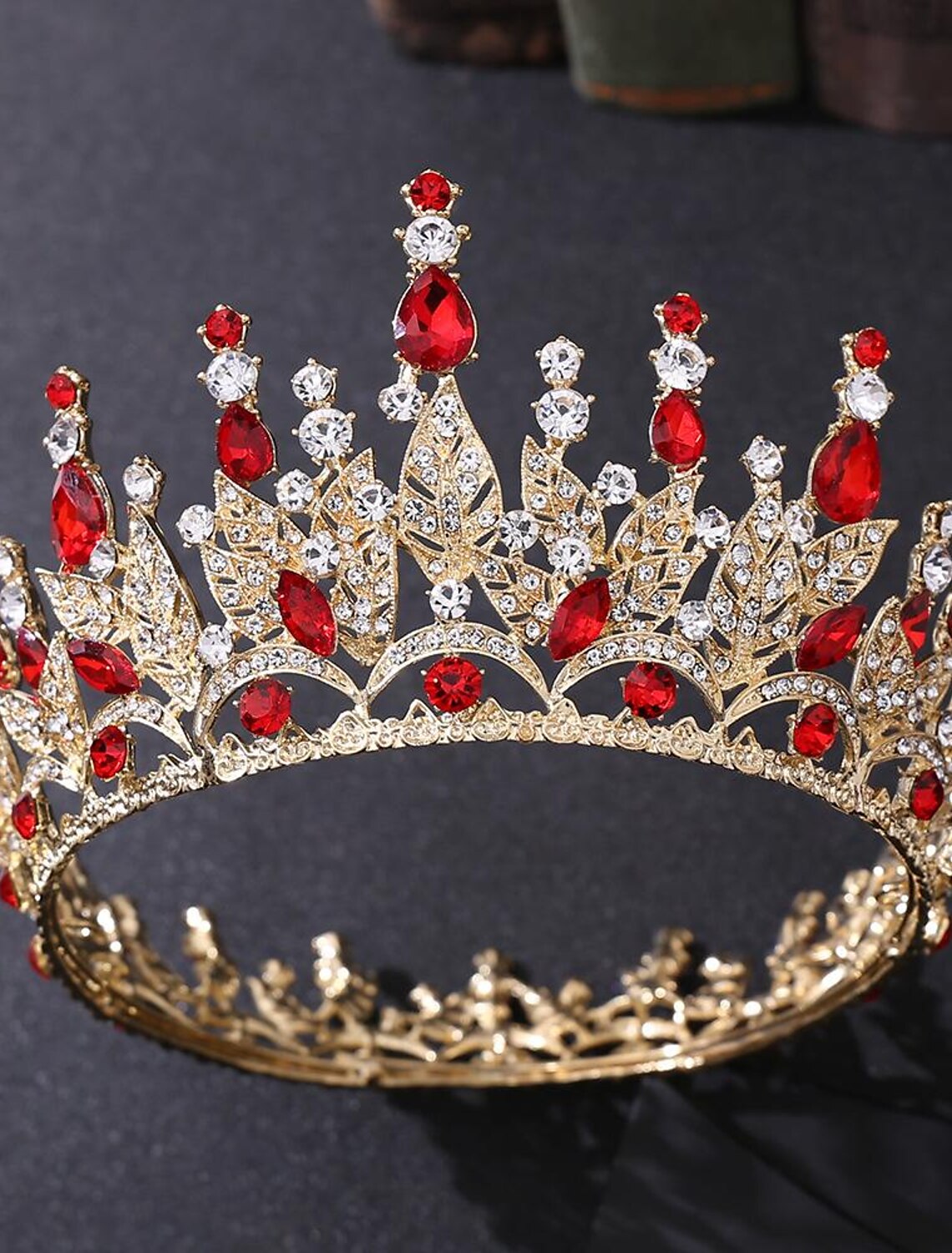 Silver rhinestone tiara crown with intricate details.