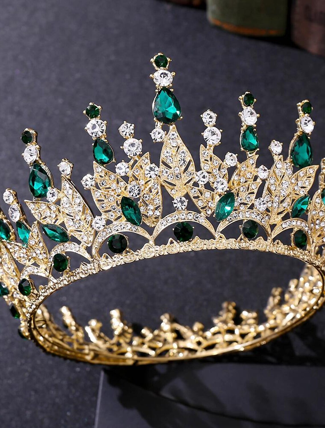 Silver tiara crown with a classic princess design.