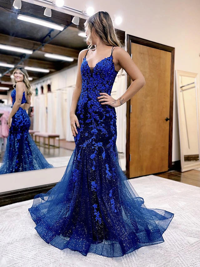 Sparkling mermaid prom dress with V-neck, glitter appliques, and court train.