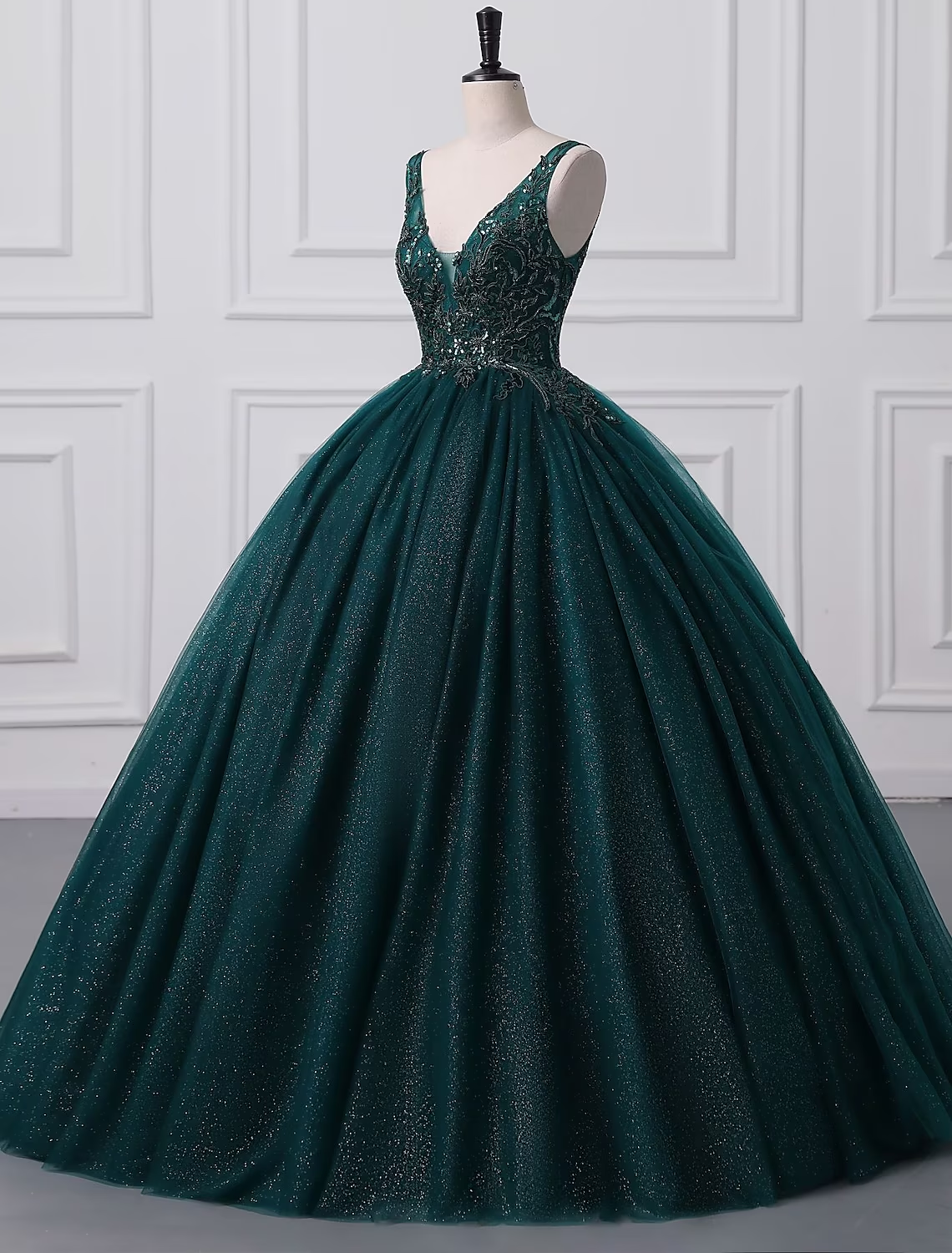 Full view of the floor-length ball gown from the back.