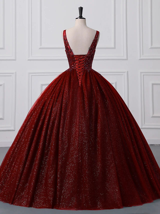 Model showcasing the flowing floor-length skirt of the dress.