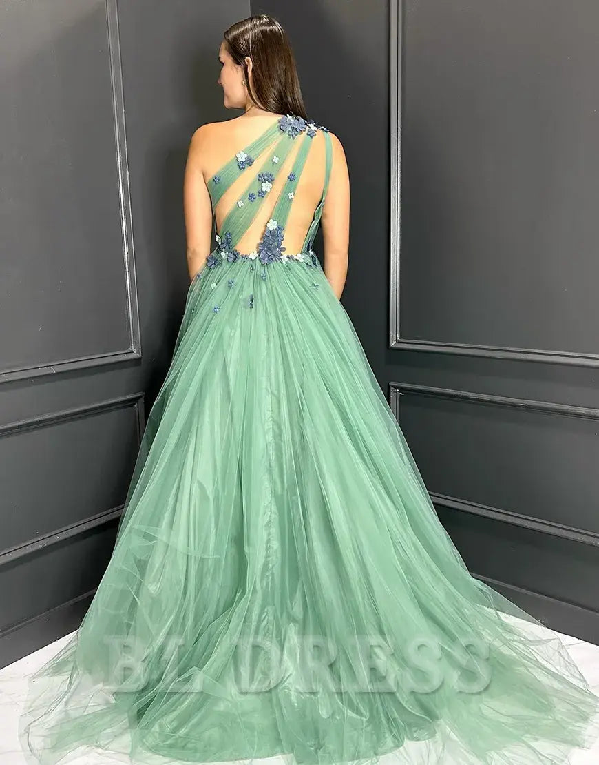 Back view of the green A-line one-shoulder evening gown.