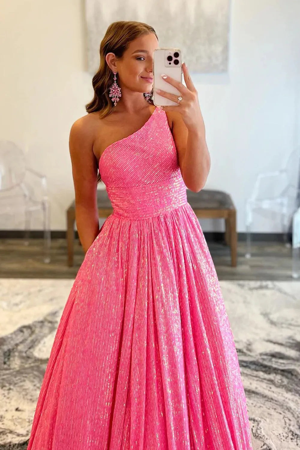 Back view of the elegant one-shoulder sequin A-line prom dress.
