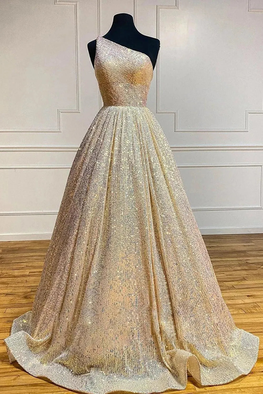 Close-up of sequin detail on the one-shoulder prom dress.