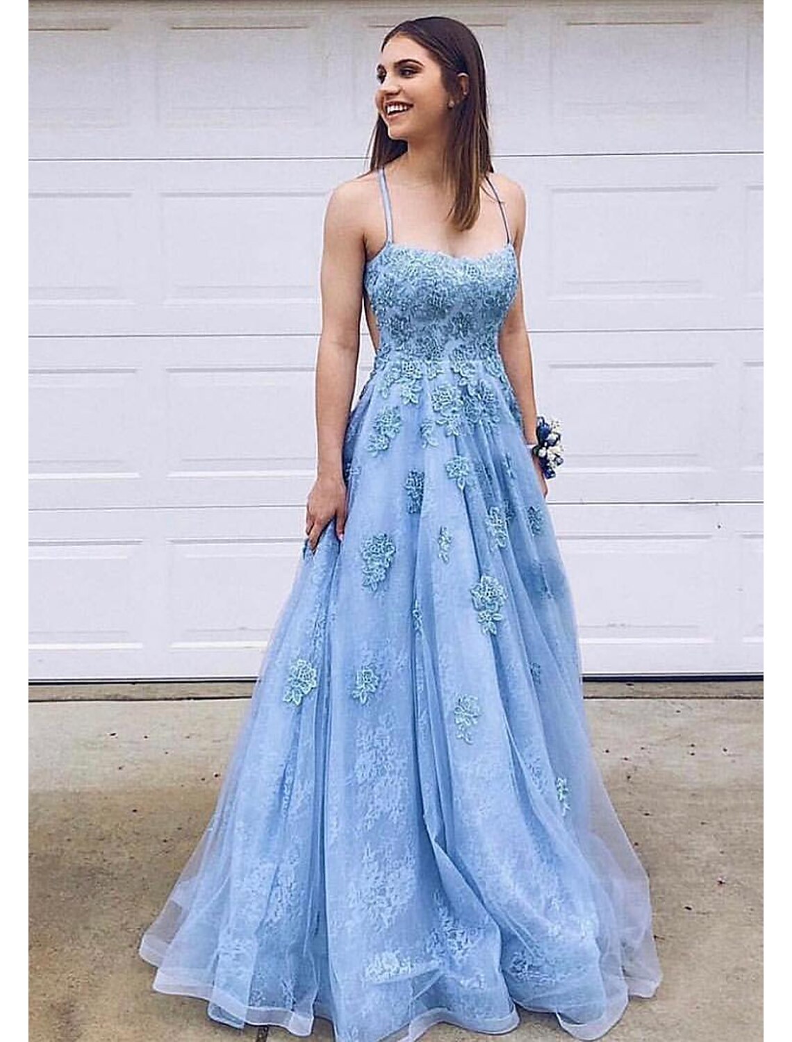 Sparkly A-line ball gown with sweetheart neckline and floor-length tulle skirt, shown from the front.