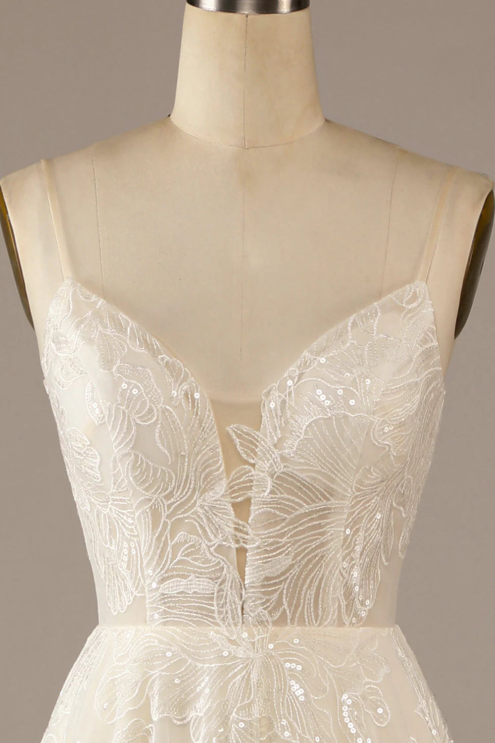 Back view of the sparkly lace wedding dress, highlighting the elegant sweep train.
