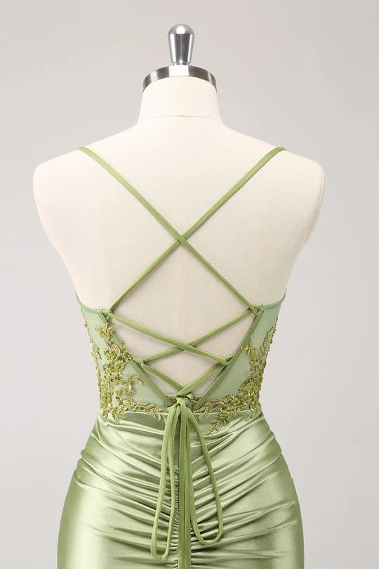 Back view of the sparkly A-line homecoming dress, showing the lace-up detail.