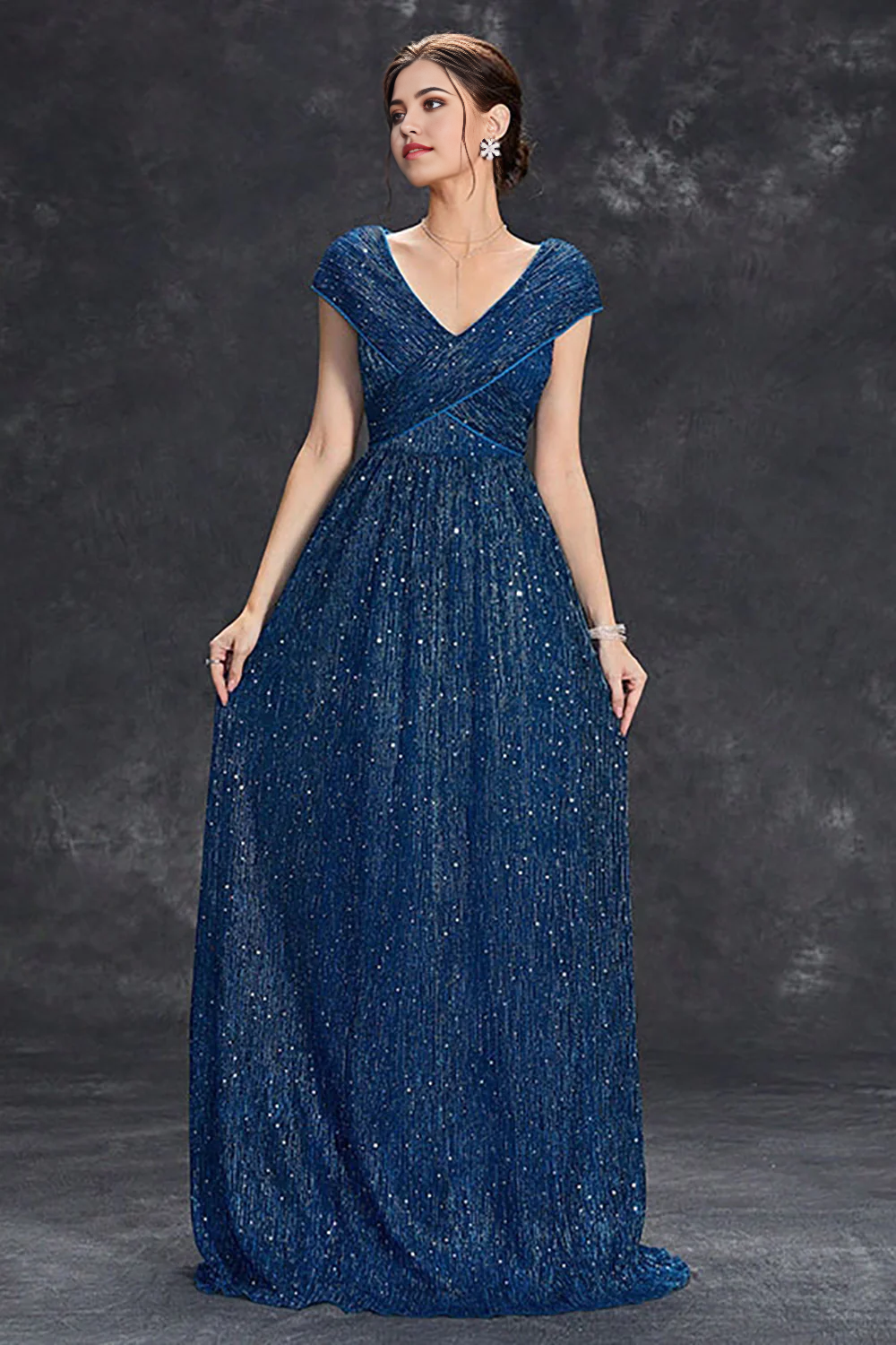 Close-up of the sparkly fabric on the A-line V-neck formal dress.