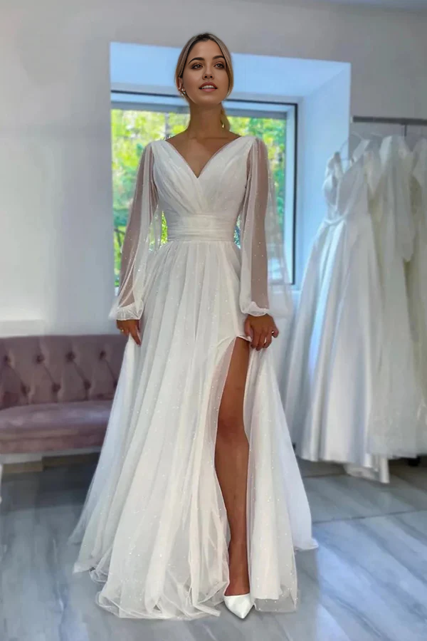 Sparkly A-line V-neck long sleeve wedding dress.