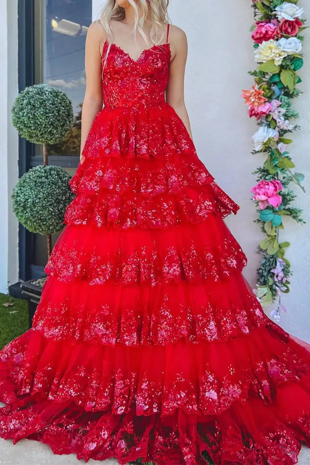 Full length view of a woman posing in the elegant A-line sequin formal dress.