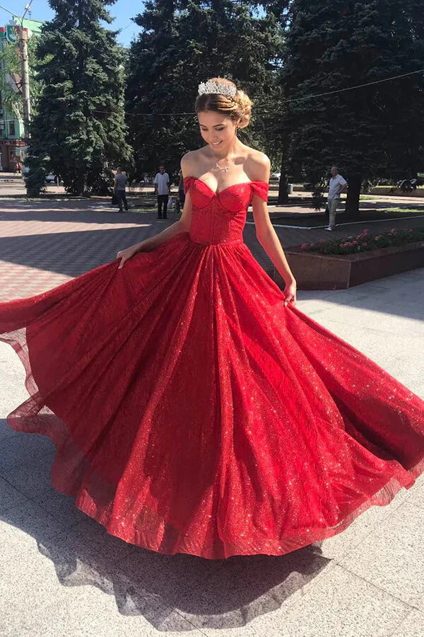 Sparkly A-line off-shoulder red prom dress with tulle skirt.