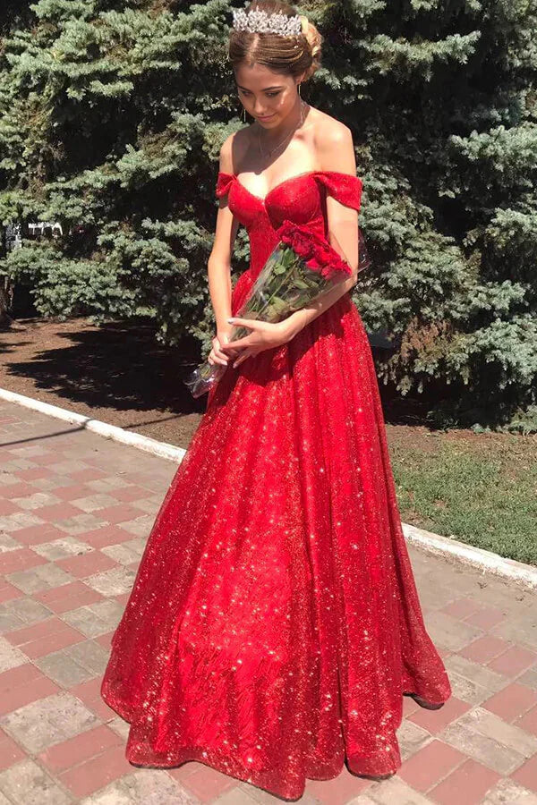 Back view of the long sparkly red A-line off-shoulder prom dress.