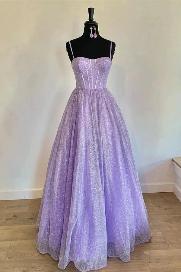 Sparkly A-line prom dress with sweetheart neckline and spaghetti straps.