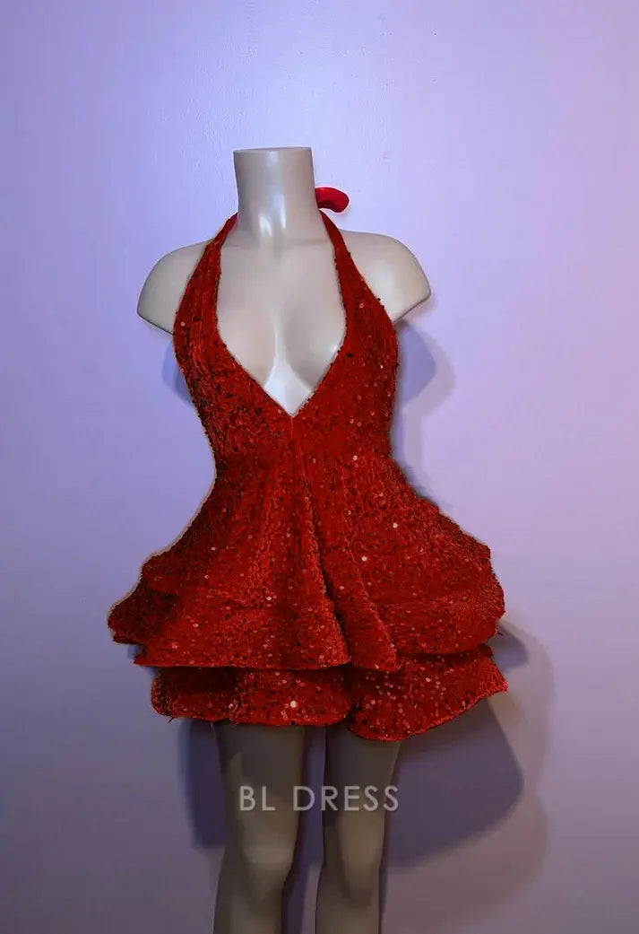 Model wearing a sparkly red A-line V-neck sequin formal dress.