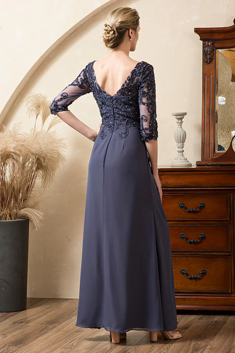 Close-up of the sparkly beading and V-neckline on the blue chiffon dress.