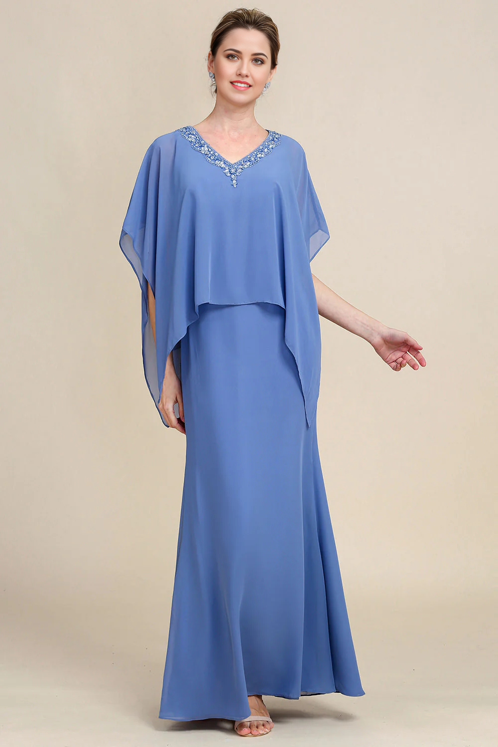 Side view of the A-line dress, highlighting the flowing silhouette and batwing sleeves.