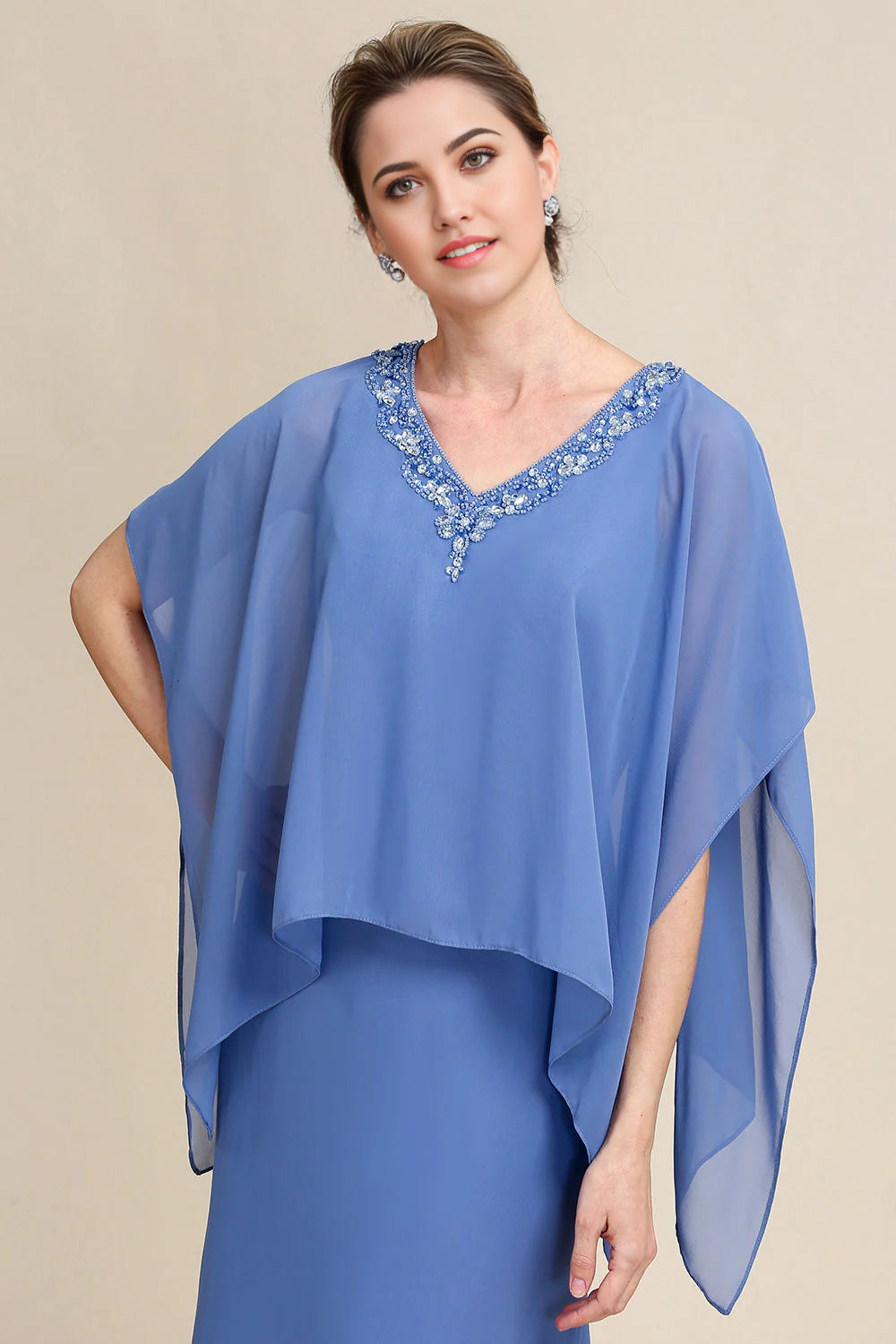 Model wearing the V-neck batwing sleeve dress, demonstrating its comfortable fit.
