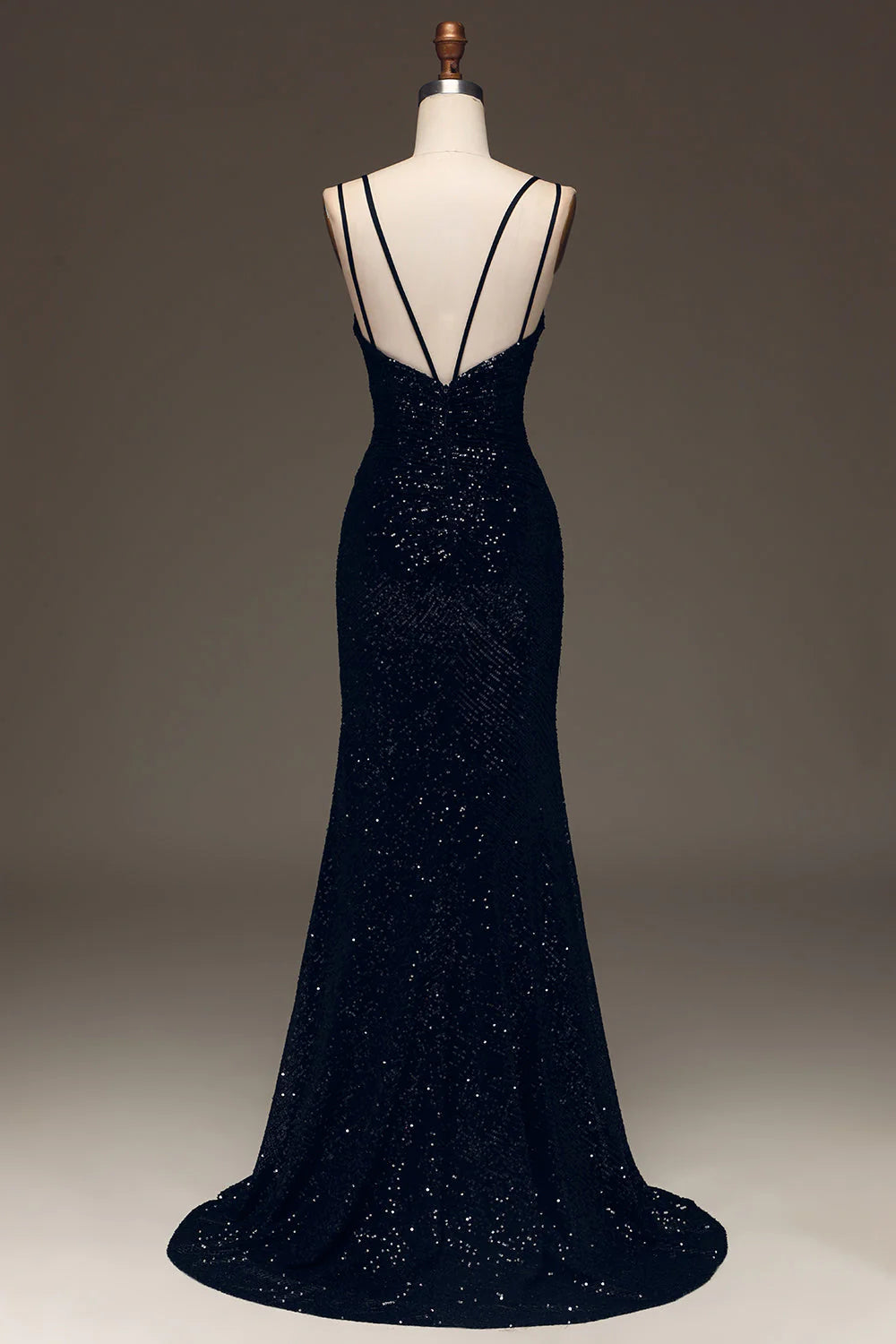 Back view of a sparkly black mermaid prom dress.