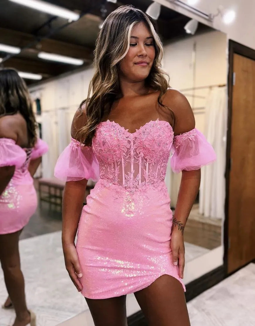 Sparkly bodycon homecoming dress with lace and sequin details, featuring detachable sleeves.