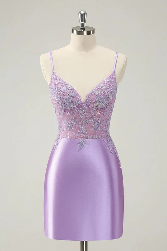 Lilac sparkly bodycon mini dress with spaghetti straps and sequins.