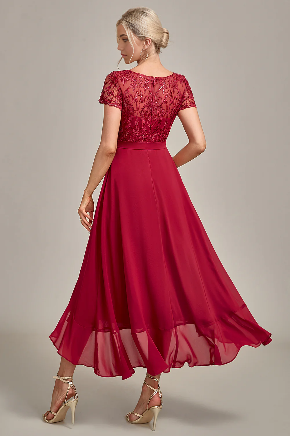 Elegant burgundy sequin gown with V-neckline and A-line silhouette.