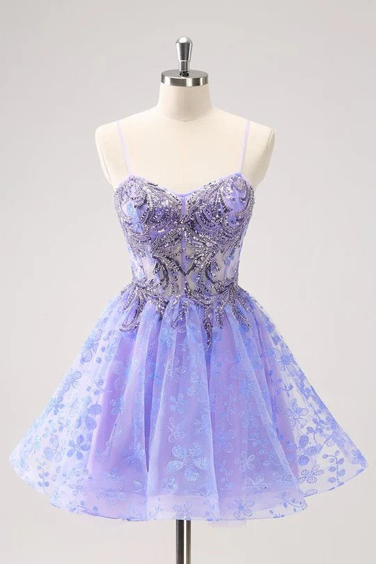 Woman wearing a sparkly floral A-line V-neck short homecoming dress with a corset bodice.