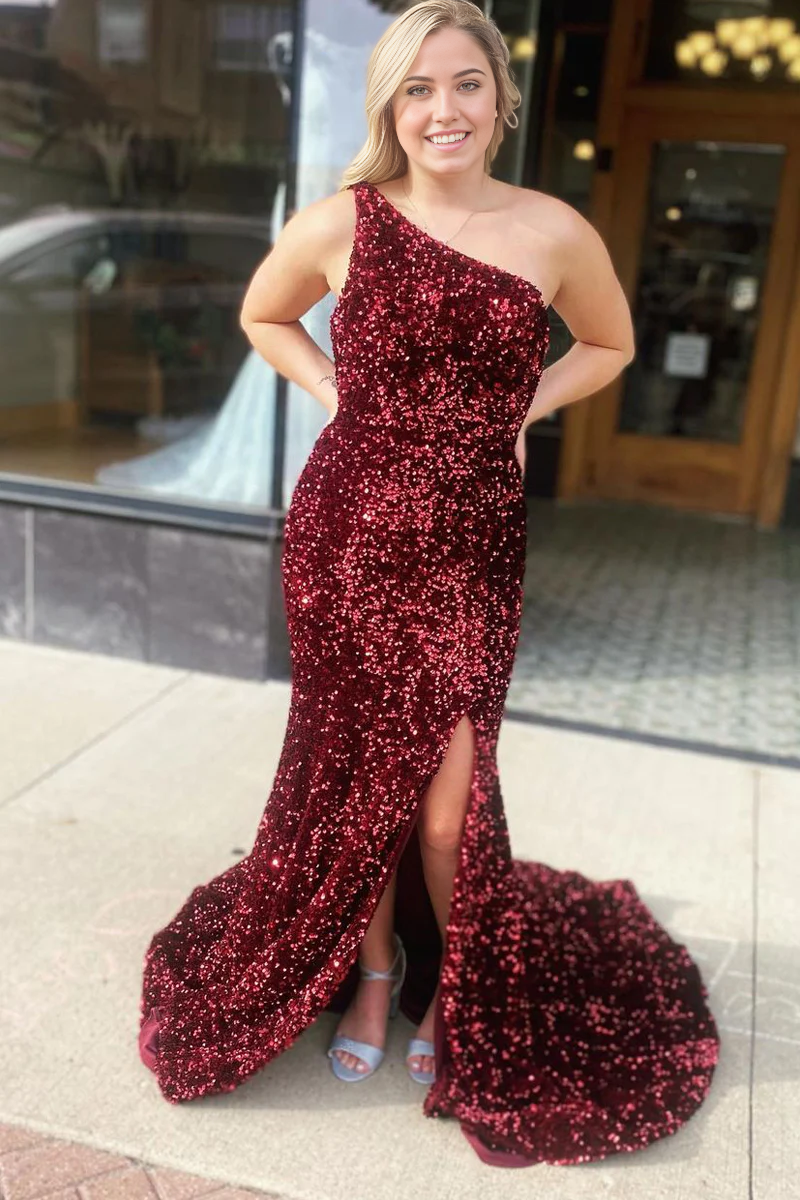 Burgundy sequin mermaid prom dress with one shoulder and high slit.