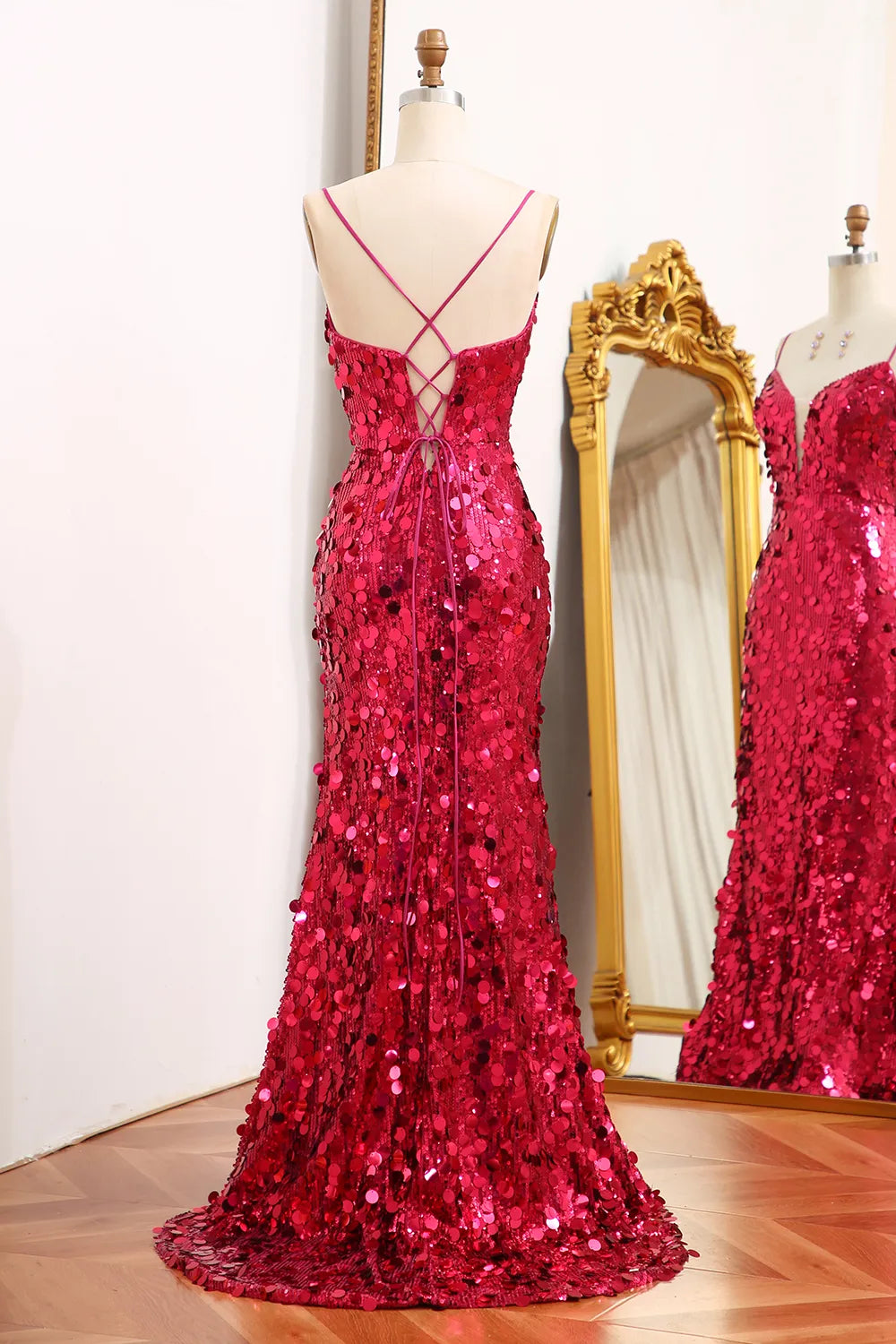 Back view of a long sequin mermaid dress.