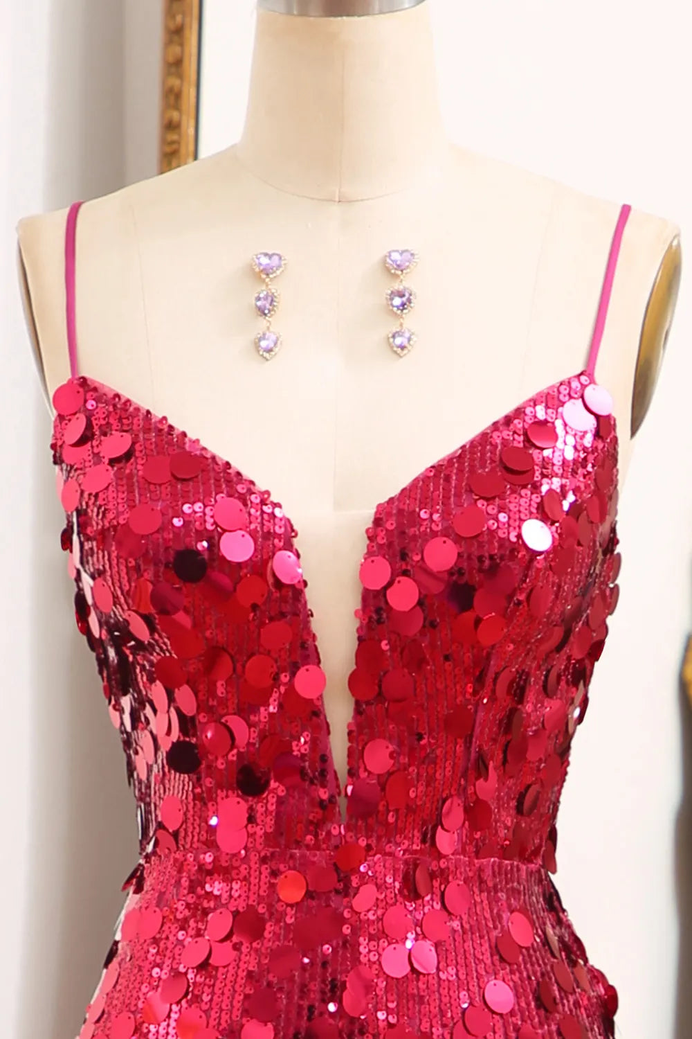 Full length view of a woman wearing a sequined mermaid dress.