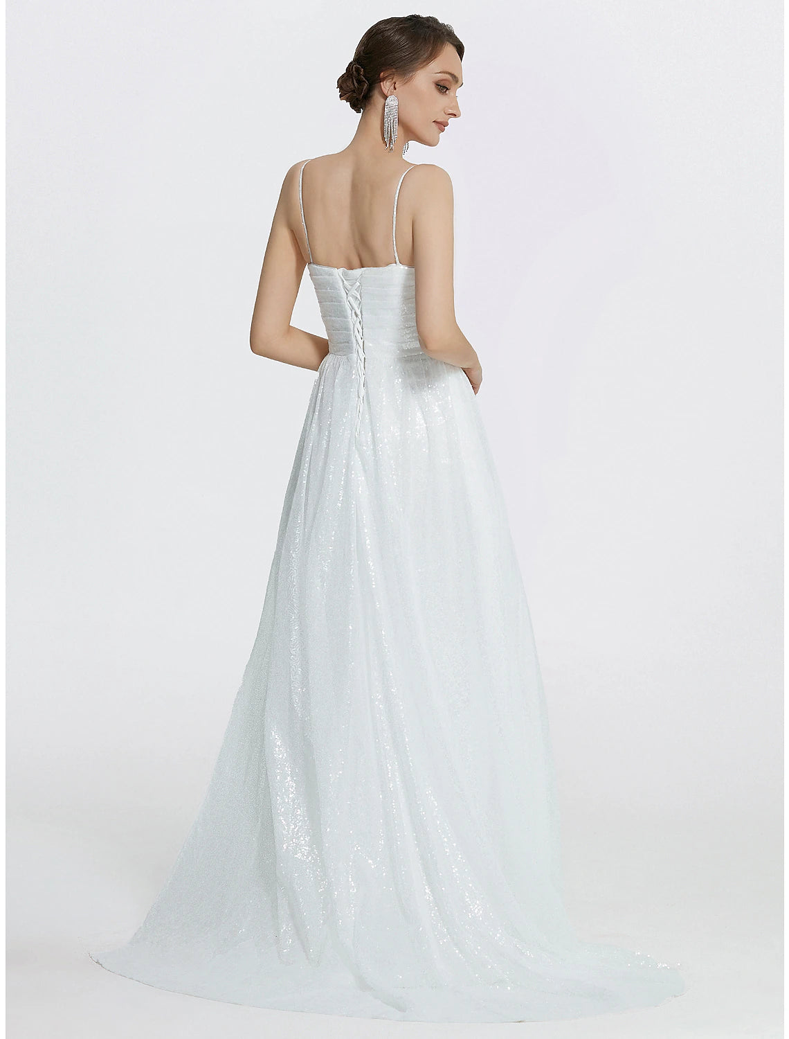 Back view of the sparkly mermaid trumpet dress, showing the floor-length design.