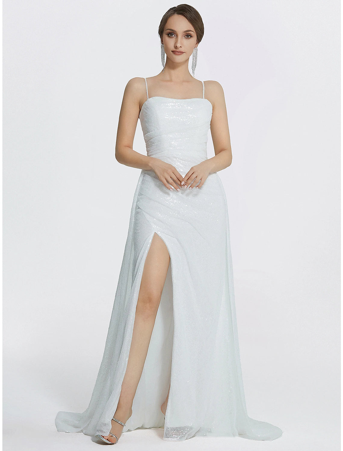 Another angle of the sparkly mermaid trumpet dress, emphasizing its elegant flow.