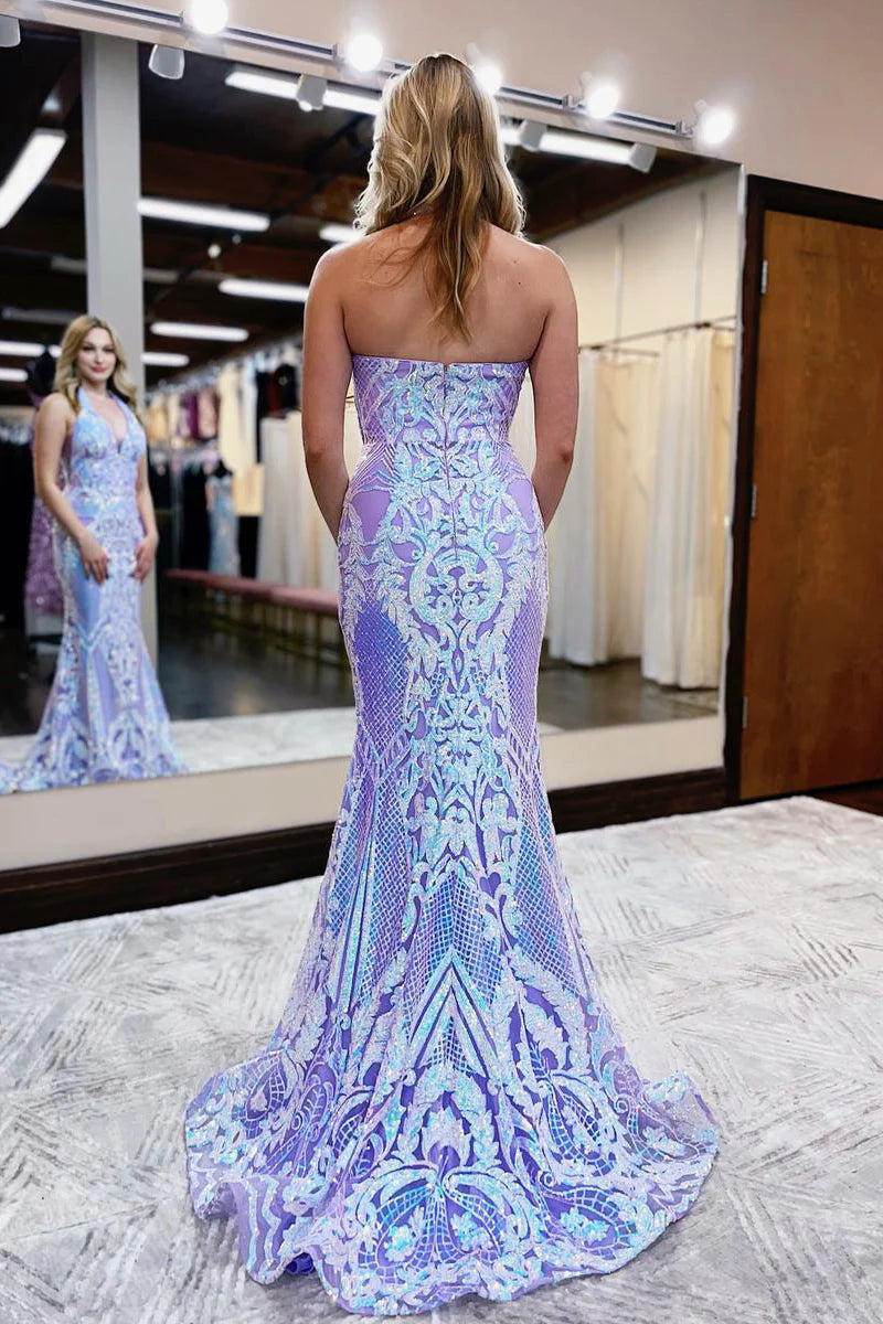 Close-up of the intricate sequin and lace detail on a lavender V-neck prom dress.