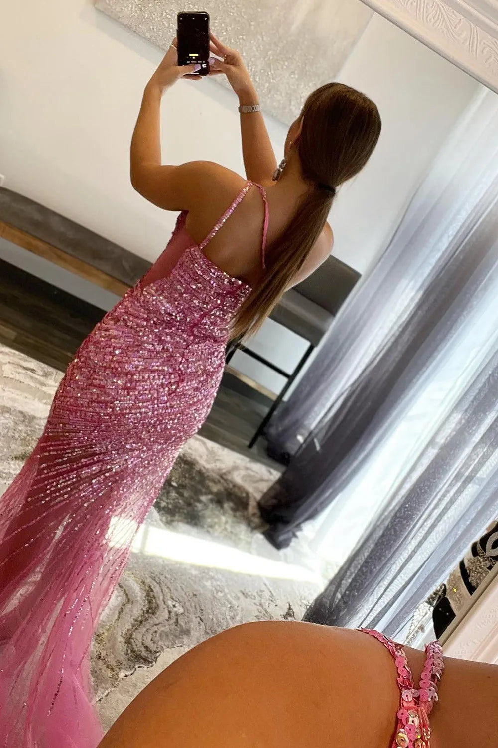 Back view of the sparkly one-shoulder sequin long prom dress, showing the elegant silhouette.