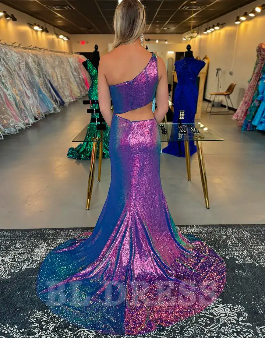 Back view of purple sequin one shoulder mermaid gown.