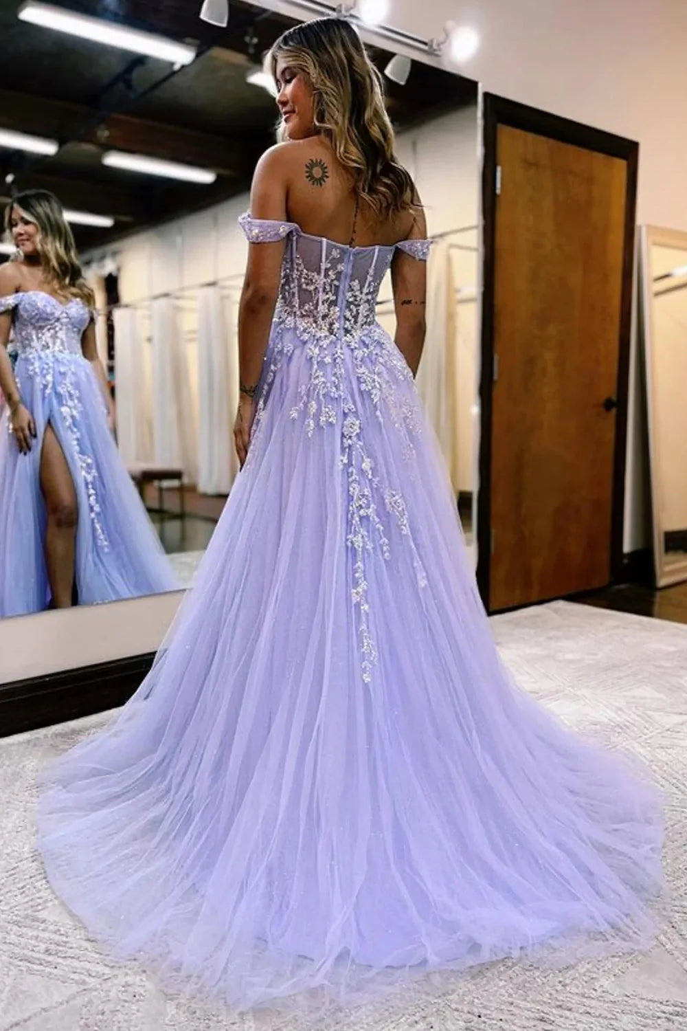 Close-up of the sequin detail and corset bodice on the A-line prom dress.