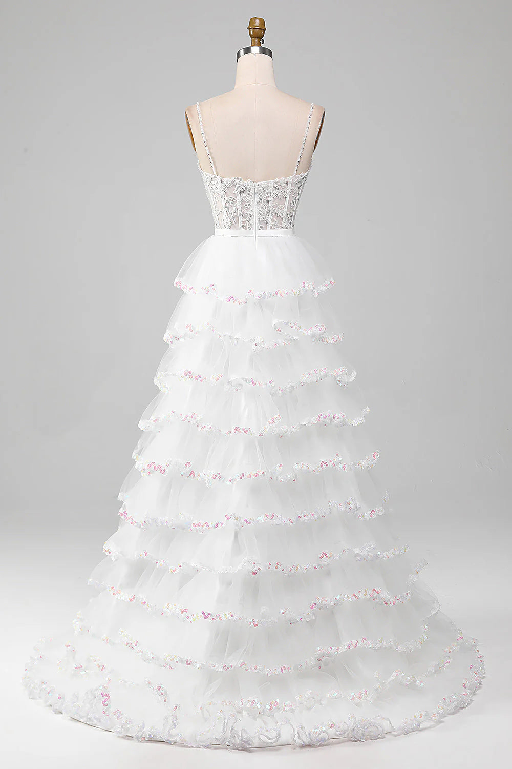 Back view of a sparkly sequin A-line prom dress featuring a corset design.