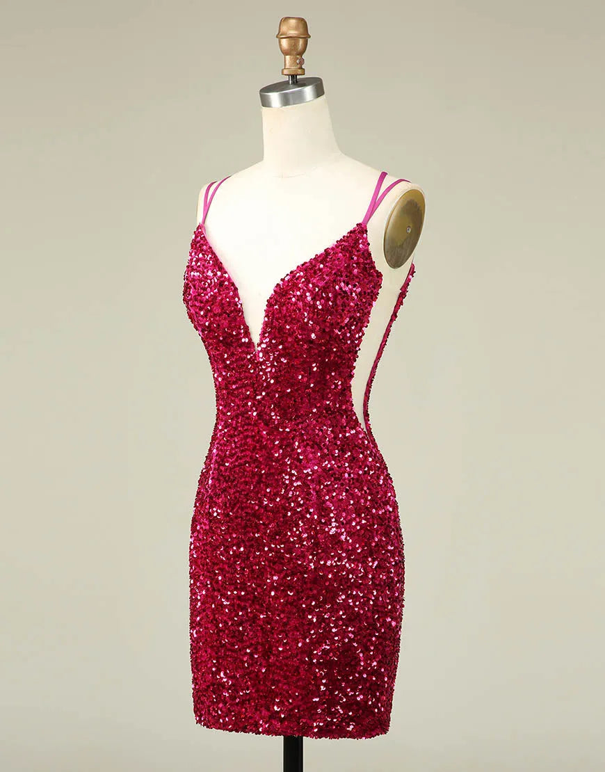 Back view of a fuchsia sequin bodycon dress with double spaghetti straps.