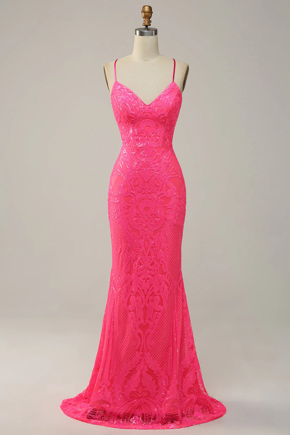 Back view of the long backless mermaid dress, emphasizing the intricate sequin details.