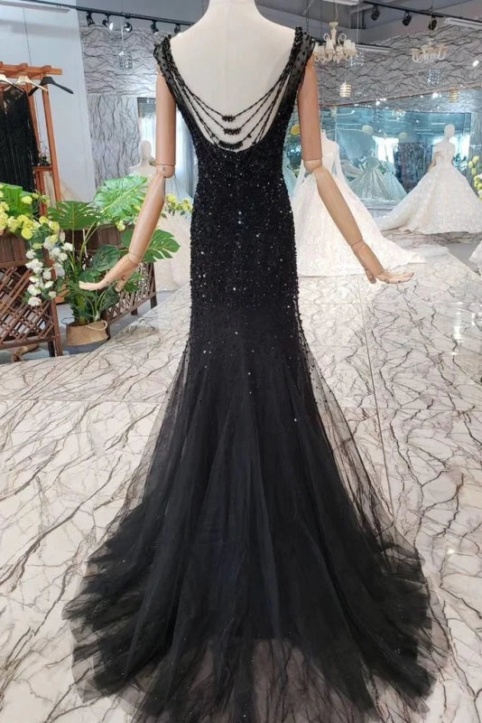 Close-up of the sequin and tulle details on the mermaid prom dress.