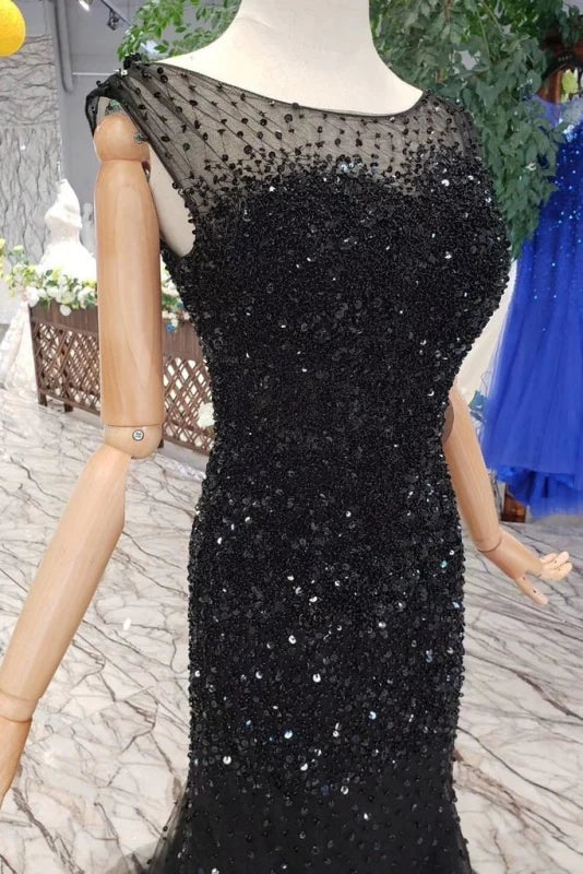 Back view of the elegant sleeveless mermaid prom dress.