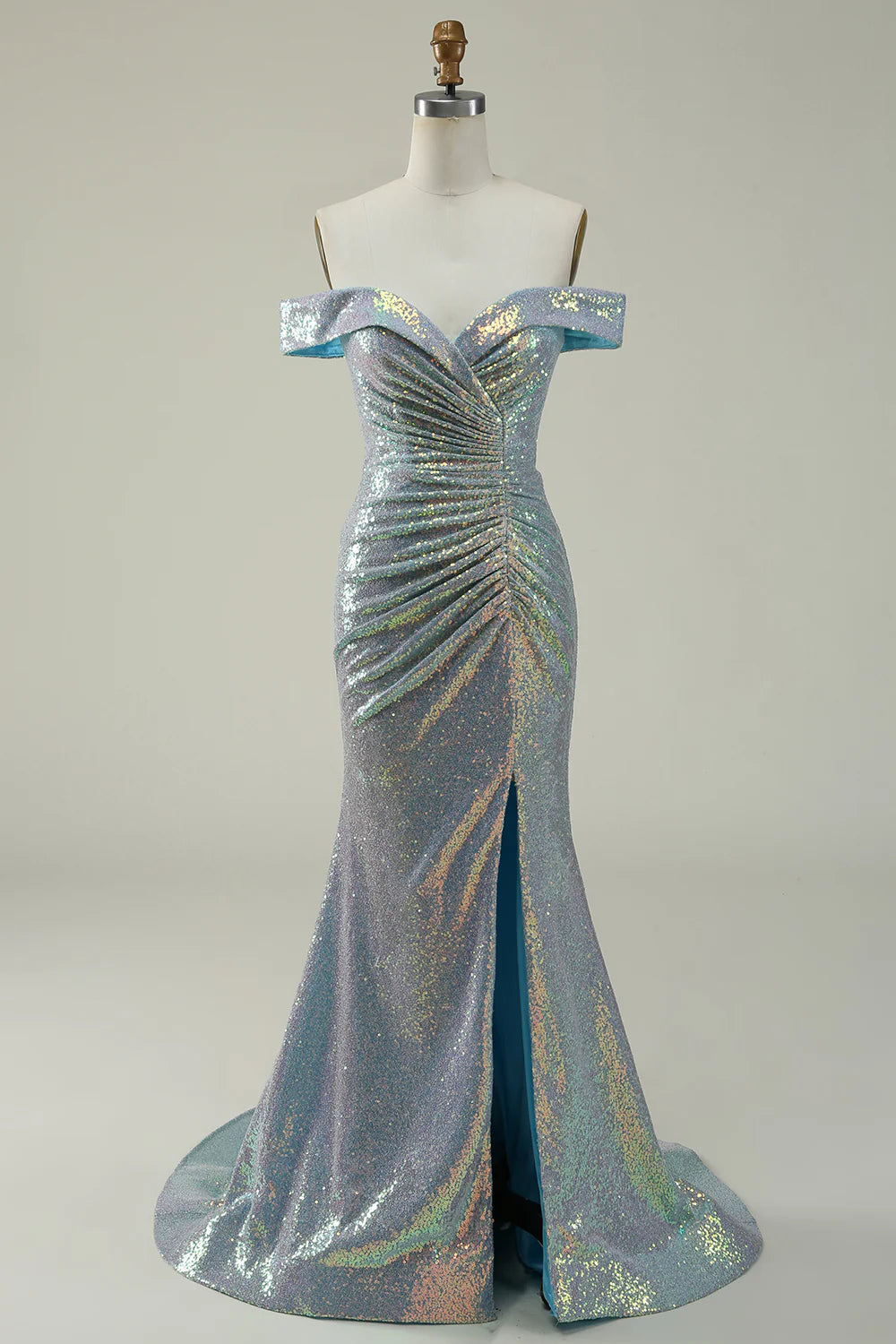 Blue sequined mermaid prom dress with a high slit.